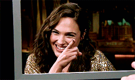19. This is Gal Gadot doing some finger thing.