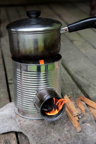 With a couple of tins and some kindling, you can make a stove. 