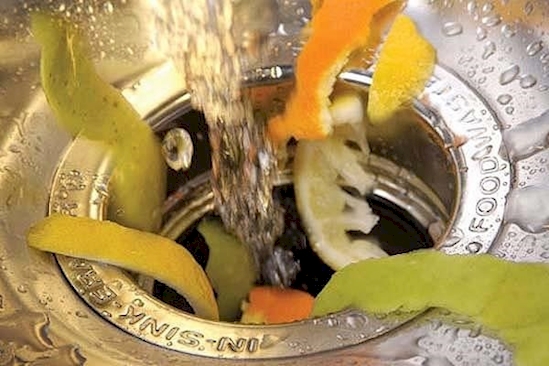 To reduce odors in your garbage disposal, put lemons and ice cubes down it every once in a while. 