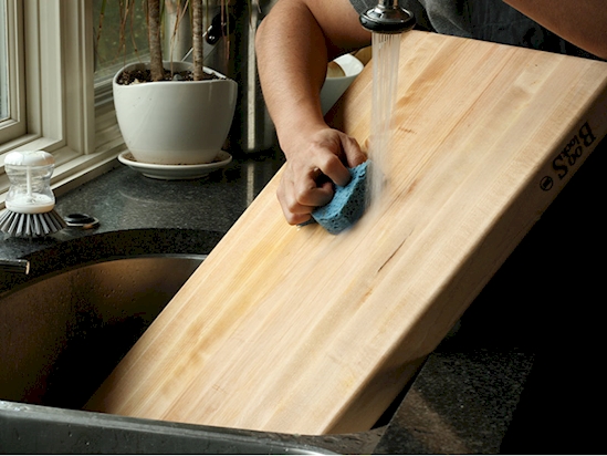 You cut raw meat on your cutting boards,so make sure that you disinfect them with bleach. 